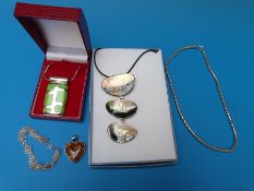 A white metal filigree bracelet marked 925,