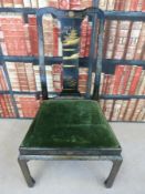 A Chinese ebonised chair with gilt decoration of a pagoda to the shaped splat and drop in