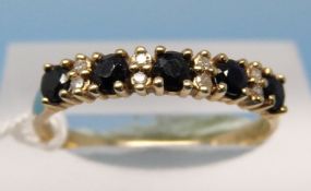 A 9ct gold diamond and sapphire ring (size P)