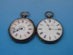 A hallmarked silver cased fob watch together with a similar white metal cased fob example