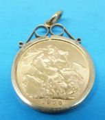 A 1908 gold full sovereign in 9ct gold mount