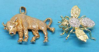 A 14ct gold brooch in the form of a bee together with a pendant in the form of a bull
