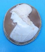 A cameo brooch depicting a warrior in yellow metal surround