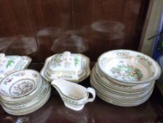 A quantity of Indian Tree pattern dinnerware comprising approximately 25 pieces in total