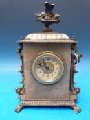 A small French mantel timepiece in marble case mounted in gilt brass surround,