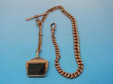 A 9ct gold graduated pocket watch chain or Albert, mounted with an agate swivel fob (51.