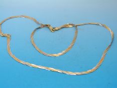 An 18ct gold tricolour necklace and a matching bracelet (8.