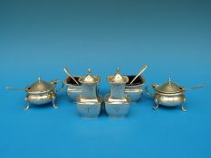 A pair of hallmarked silver peppers,