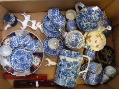 A collection of Japanese and Chinese wares including a blue and white tea set, cloisonne,