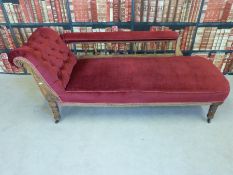 A 19thC mahogany upholstered chaise longue