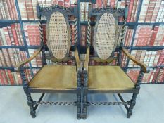 A pair of oak carver armchairs