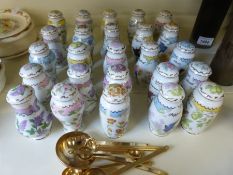 A Lenox spice set decorated with ornithological subjects in original wooden wall hanging spice rack