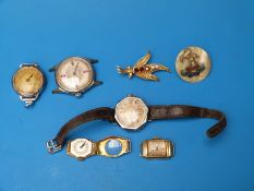 A collection of ladies' and gentleman's wristwatches,