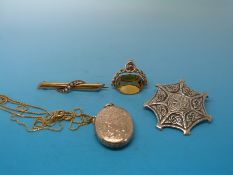 A 15ct gold bar brooch set with seed pearls, swivel fob marked 9ct, 18ct gold chain,