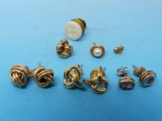 A collection of 9ct gold earrings to include knot design