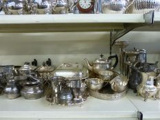 A collection of plated ware in two trays including Walker and Hall tea set, other tea sets,