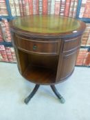 A reproduction library drum table with leather inset top (D50 x H73cm)