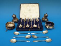 A hallmarked silver four piece cruet set,