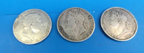 A George III 1819 crown together with two George IV examples for 1821 and 1822
