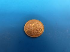 A 1911 gold half sovereign