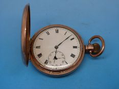 A gentleman's gold plated hunter pocket watch in a Dennison case