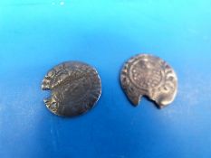 A hammered silver short cross penny thought to be King John, pierced at edge,