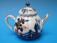 A Kangxi period Chinese miniature teapot with Imari figural decoration