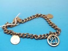 A 9ct gold charm bracelet (31.
