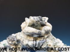 A Chinese large pale greyish-green jadeite tripod censer and cover carved with a coiled dragon