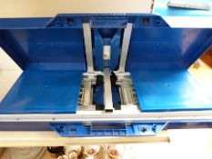 A cased folding picnic table