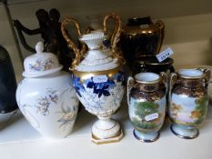 A quantity of decorative ceramics to include a garniture of vases together with a pair of bronzed