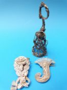 Three white metal filigree posy holders including a fine cranberry glass example