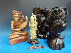 Three ethnic wood carvings and two carved fish soapstone carving