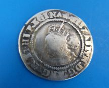 An Elizabeth I 1567 hammered sixpence with good detail on both sides,