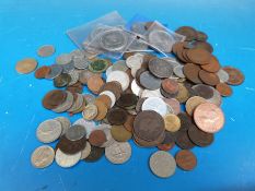 A collection of world coins including two Victorian crowns/double florins,