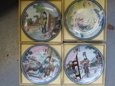 Four boxed artisan painted plates by artist 'Master Artisan Zhao Huimin'