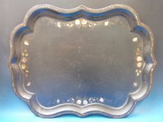 An exceptionally large shaped mother of pearl inlaid papier maché tray (length 80cm)