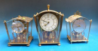 Three glass lamp/lantern style anniversary clocks