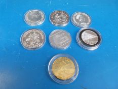 A set of seven 'World at War' commemorative coins