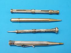 Four various propelling pencils including a hallmarked silver example,
