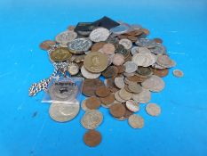 An amateur collection of UK and overseas coins, commemorative medals etc,