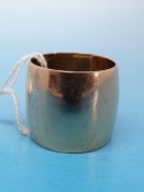 A large yellow metal ring (8.