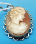 A cameo brooch with a yellow metal mount marked 9ct