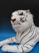 A large stuffed model of a Siberian tiger (38cm long)
