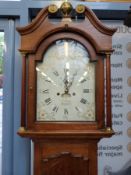 An oak eight-day early 19th century long case clock with painted dial,