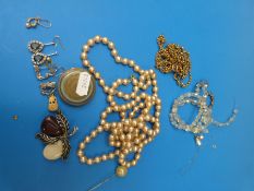 A rolled gold chain, faux pearls, three pairs of earrings, brooch,