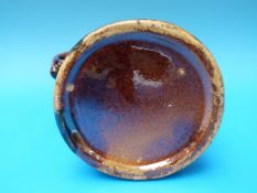 A Measham type Toby taking snuff (24cm tall)