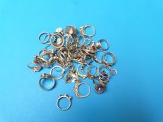 A large quantity of silver/ white metal rings
