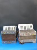 A 24 bass Hohner Student III piano accordion cased together with an 8 bass Alvari example