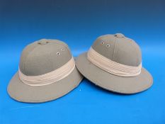 Two canvas covered pith helmets by repute offered to Prince Charles and Princess Anne when visiting